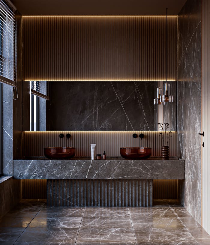 Elegant modern bathroom with marble design, double sink, and ambient warm lighting.