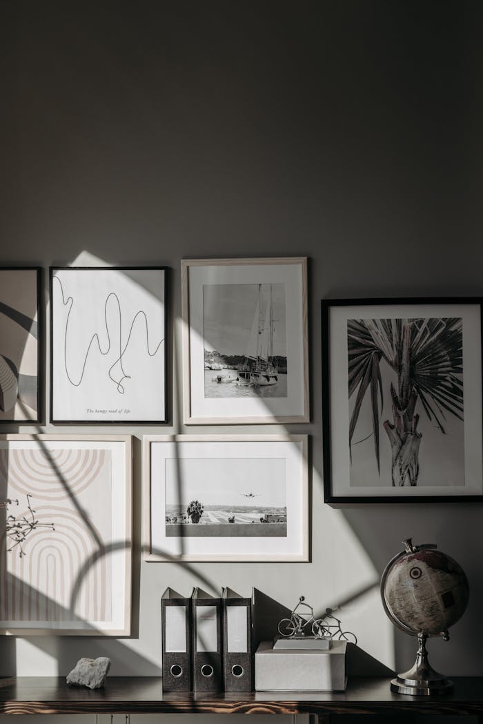 Stylishly arranged wall frames and decor create a contemporary interior space.
